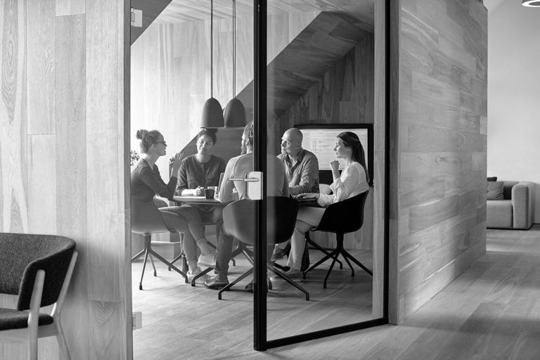 team in beautiful conference room